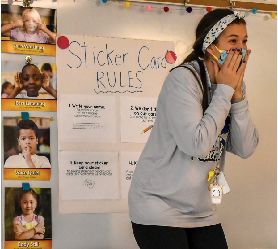 Ashley Dietz, a kindergarten teacher at Parrish Elementary School, tells the donut class they have completed their sticker cards and earned a “stinky feet party” and will not be required to wear shoes Monday when they come back to class Nov. 6 2020. 
