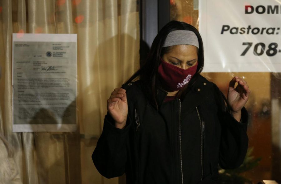 Francisca Lino prays with supporters outside the Adalberto Memorial United Methodist Church, 2716 W. Division St., before heading home to Romeoville on Jan. 23, 2021, in Chicago. (John J. Kim / Chicago Tribune/TNS)

