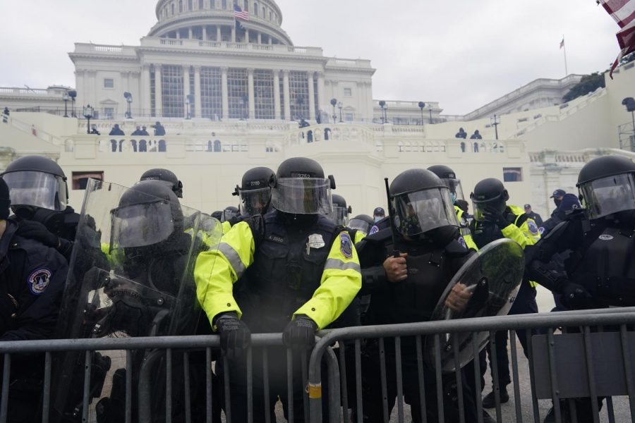 WASHINGTON, DC - JANUARY 06: Police try to hold back protesters who gather to storm the Capitol and halt a joint session of the 117th Congress on Wednesday, Jan. 6, 2021, in Washington, D.C. (Kent Nishimura/Los Angeles Times/Tribune News Service)