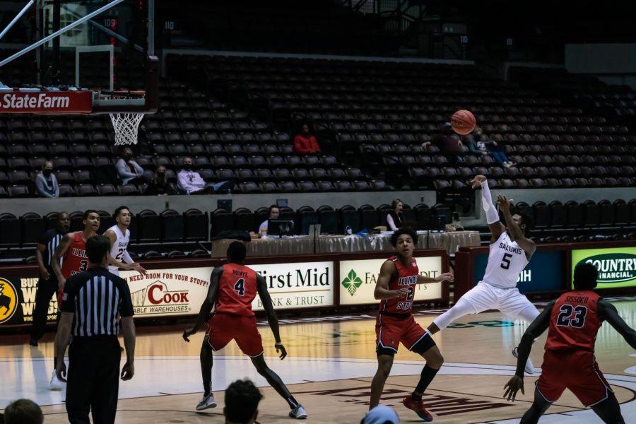 Lance Jones (5) shoots the ball in game two against Illinois State University Sunday, Feb. 14, 2021, at the SIU Banterra Center. Jones played all 40 minutes for the Salukis.