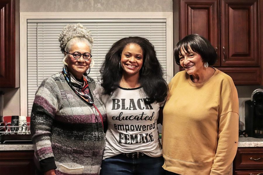 Evie Allen (center) poses for a photograph with her mother, Clarissa Allen (left), and her aunt, Anita Csaszar (right), Feb. 13, 2021, in Marion, Ill. The three women discussed how, no matter what hairstyle or texture someone has, it should be accepted and embraced because it is not for any one person to dictate what hairstyles are right or wrong. “Whatever I do to my hair, it’s me that I’ve got to please, even though we’ve spent so much time trying to please somebody else,” Clarissa Allen said. 