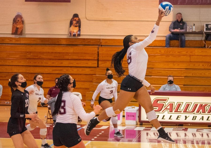 SIUs Imani Hartfield goes up to spike the ball over during the game verse Indiana State on Sunday, March 7, 2021 in Davies Gym at SIU. The Salukis would go on to lose 3-0 to the Sycamores.  