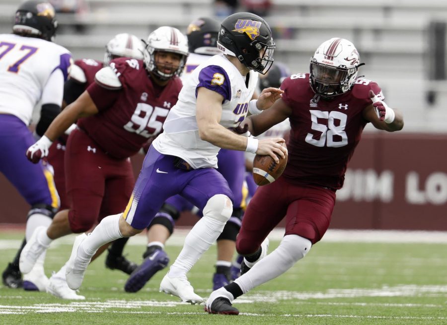 Saluki defensive end Chucky Sullivan chases Panthers QB Will McElvain during the Saluki’s 17-16 win at Saluki stadium on Saturday, March 13, 2021.