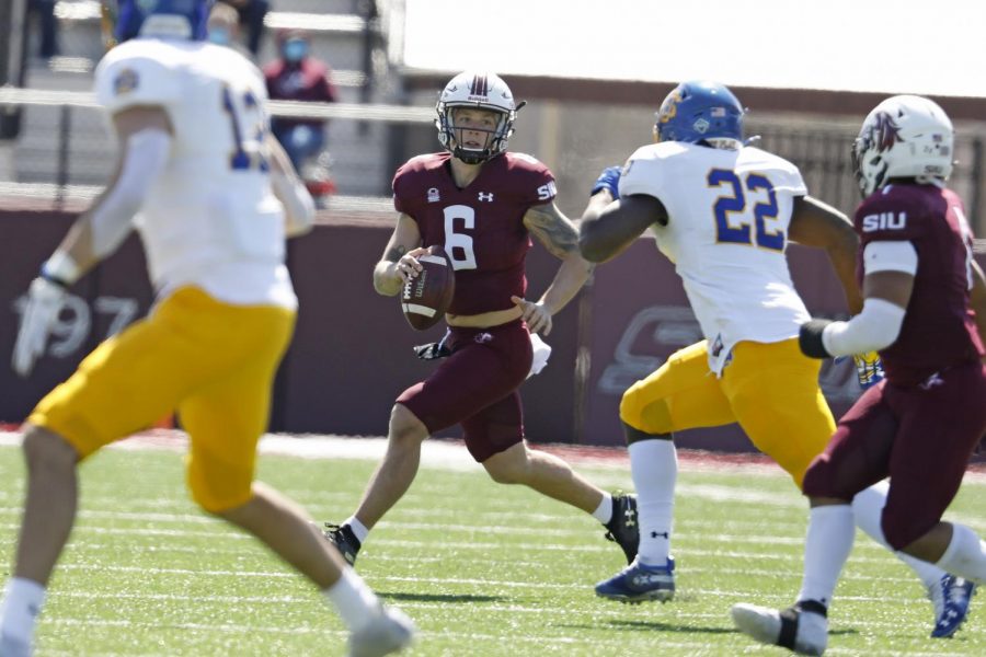 Saluki quarterback, Stone Labanowitz, looks for the open man during Saturday’s game at Saluki Stadium on March 20, 2021. SIU lost to South Dakota State by the score of 44-3. 