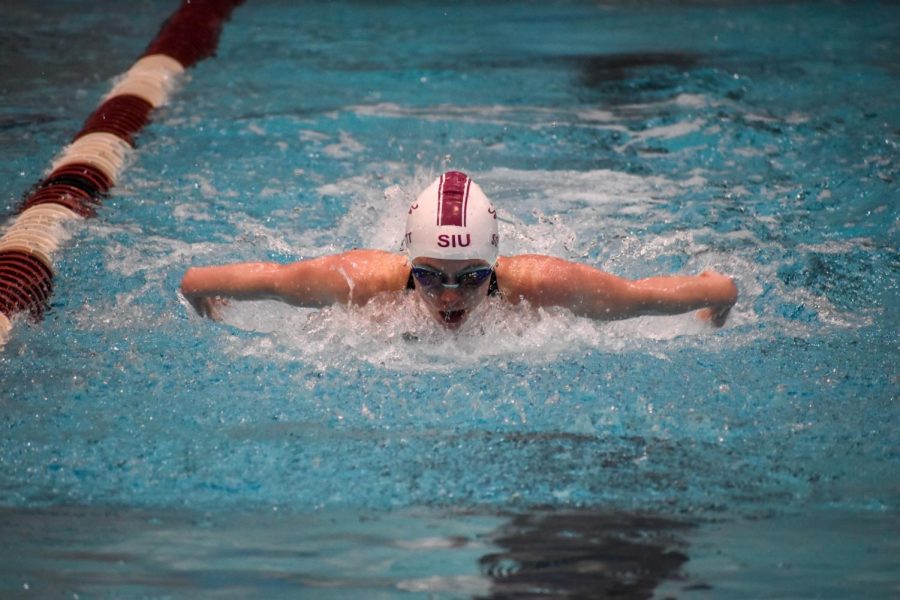 Senior, Brittany Scott, swims the women's 100-fly on Friday, March 19, 2021. 