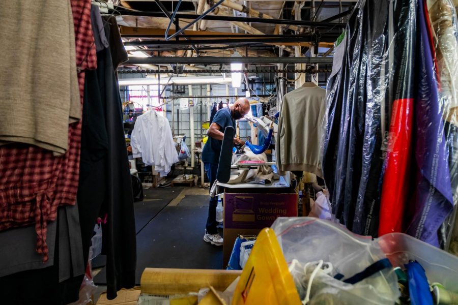 Mike Lilly irons clothing Tuesday, Mar. 2, 2021 at Horstman’s Cleaners & Furriers in Carbondale Ill. Chris Bishop | @quippedmediallc