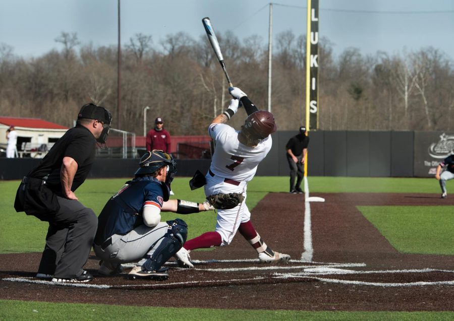 Austin Ulick (7) hits the ball towards the center field in the game against University of Tennessee at Martin on Sunday, Mar. 7, 2021 at Itchy Jones Stadium in Carbondale Ill.