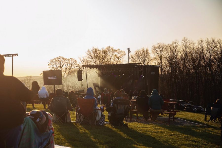 The sun begins to rise on Easter on Sunday, April 4 People grabbed chairs and warm clothes to enjoy the annual program organized by the Bald Knob Cross.
