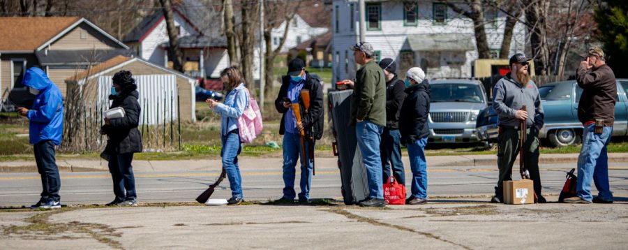 People wait in line at the Gun Buyback event on Friday, April 2, 2021 in Decatur, Ill. 