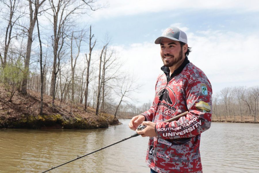 Thomas (TJ) Johns reels in a line March 31, 2021, at Kinkaid Lake in Jackson County, Ill. Johns said the Saluki Bassers are looking for new members and accept people of all experience levels in their club. 