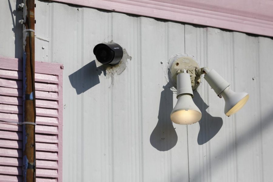 A surveillance camera, one of five, mounted on the side of Susan Stone’s trailer home in Lenzburg, Ill., Sunday, April 4, 2021.  After someone firebombed the back of her trailer a few years ago, causing about $1,000 worth of damage, Stone mounted the cameras as a deterrence.  The person responsible was never caught.