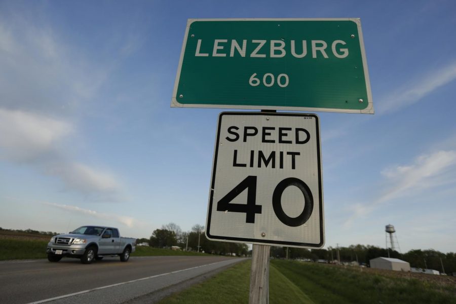 The town of Lenzburgs population sign on a road leading to Susan Stone’s trailer. Stone says she feels the people of Lenzburg don’t want her living there. “I’m too different for them, you know what I mean.  I’m too colorful,” Stone said.
