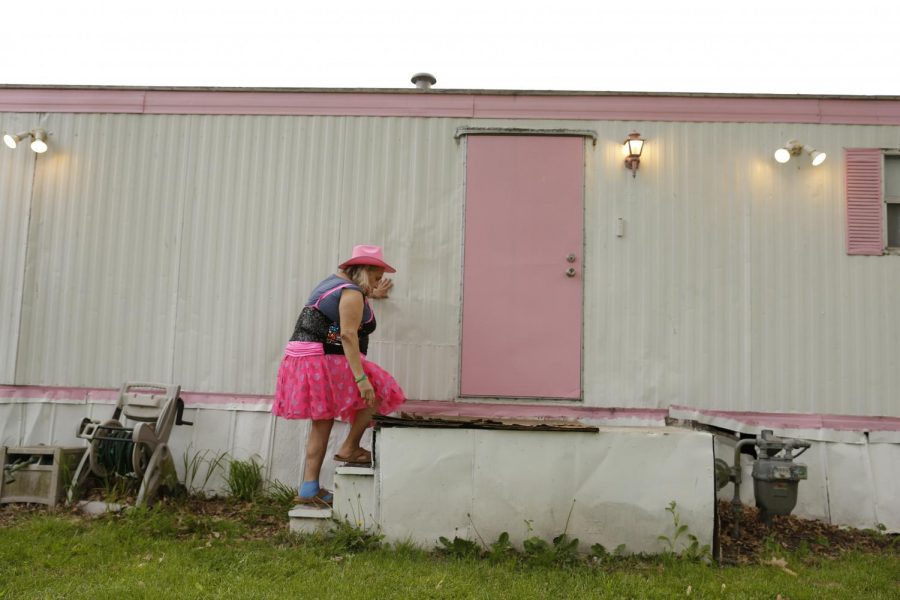 Susan Stone outside of her trailer home in Lenzburg, Ill., Tuesday, April 27, 2021.
