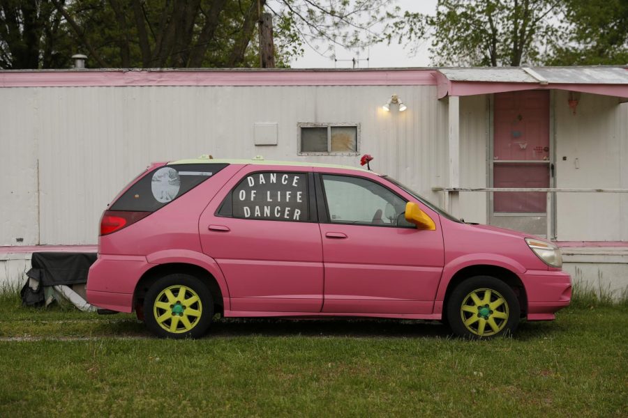Susan Stone’s pink van outside of her trailer in Lenzburg, Ill., Tuesday, April 27, 2021.  Stone selected this shade of pink after the salesman at the paint shop told her it would be seen from five miles away. “Honey, thank you for answering my question, that’s the one I want!” Stone says she told the salesman.
