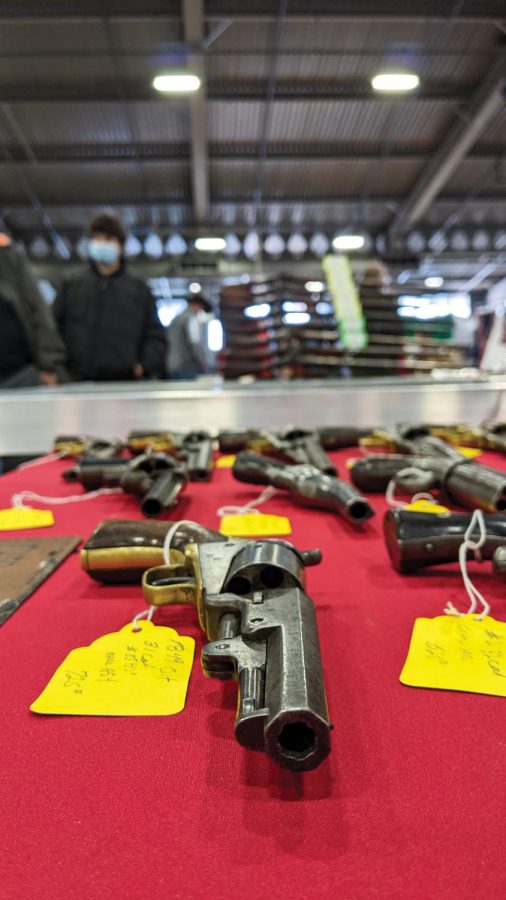 An antique pistol sits with a price tag on a table at Wanenmacher’s Tulsa Arms Show on April 10 and 11, 2021, at Expo Square in Tulsa, Okla. A large collection of antique weapons were seen in the show which was organized this year as COVID-19 canceled the show last year.