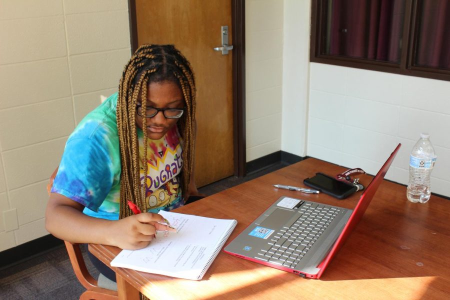 Jada Brown, a freshman majoring in cinema, does her homework in Kellogg Hall Aug. 27, 2021, in Carbondale, Ill.