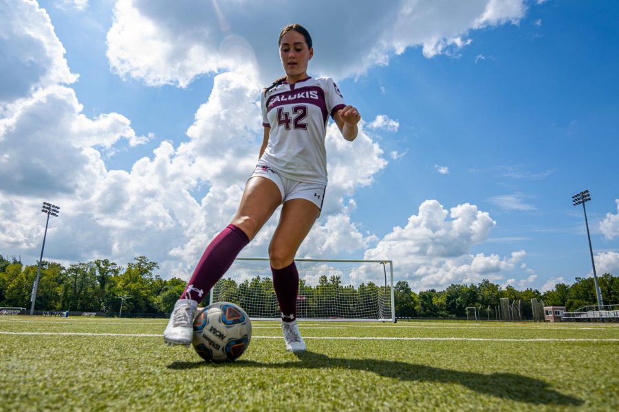 SIU womens soccer player, Sam Dodd, poses for a photo. Dodd, a transfer player from University of Wisconsin-Milwaukee has joined the Saluki team for the 2021-2022 season. “I just want to be a goal-scorer and a teammate and player that everyone will be able to count on. I want them to be able to think that when Sam is in, she’s going to score goals and produce to make an impact on the game,” said Dodd Sunday, Aug. 29, 2021 at Lew Hartzog Track and Field Complex at SIU. 