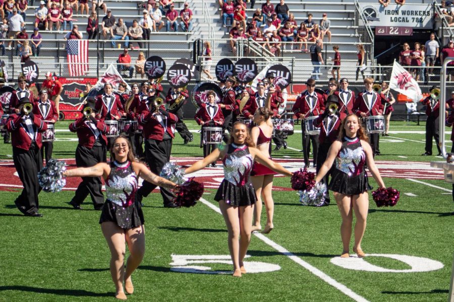 SIU spirit team and the Marching Salukis perform at the opening ceremony before the kickoff for the football game against Illinois State University Sept. 25, 2021 at the Saluki Stadium in Carbondale, Ill. 