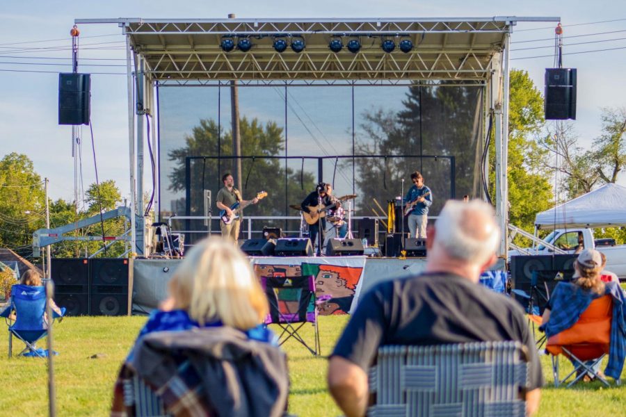 Radio Free Honduras performs music to a field of concert attendees Sept. 24, 2021 at the Off the Rails concert series in Carbondale, Ill.