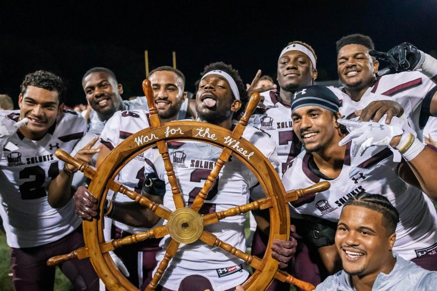 James Ceasar (2) holds the wheel with his teammates after defeating Southeast Missouri State University 47-21 Sept. 2, 2021 at Houck Stadium in Cape Girardeau, Mo. 