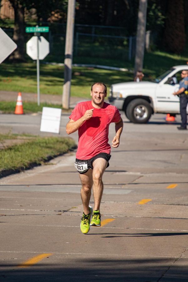 32-year-old, Bailey Bunyan, sprints to the finish line Sept. 25, 2021 at the Superhero 5K in Carbondale, Ill. 