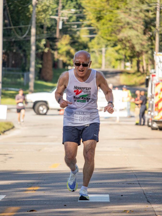 Marvin Zeman, age 73, finishes the Superhero 5K race with a time of 26 minutes and 43 seconds Sept. 25, 2021 in Carbondale, Ill. 