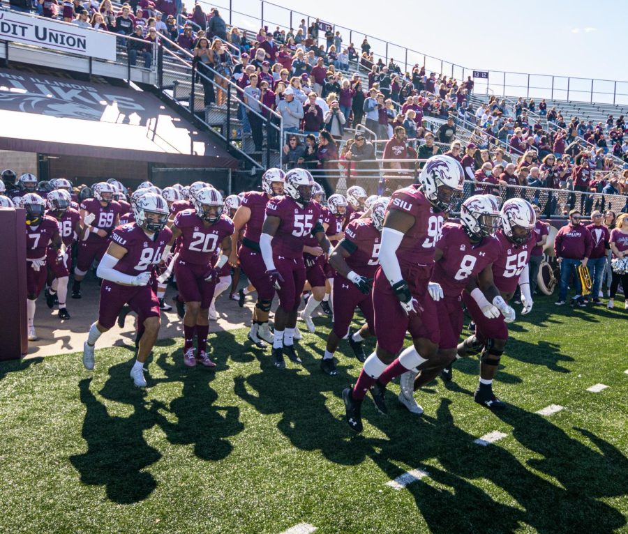 Salukis football team takes the field for the game against North Dakota during the homecoming game on Saturday, Oct. 16, 2021 at Salukis Stadium at SIU.   