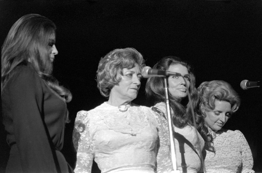 June Carter Cast stands on stage with her mother, Maybelle Carter, and her sisters, Anita and Helen Carter Oct. 22, 1971 in Carbondale, Ill. John T. Soden | weaselvideoproductions.com