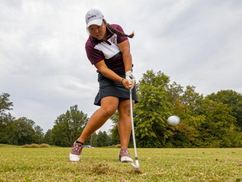 SIU golfer Moyea Russell takes a swing at a ball on Friday, Oct. 1, 2021 at Hickory Ridge Public Golf Course in Carbondale, Illinois. Russell, who was named MVC golfer of the week recipient in late September, after hitting three rounds of 74, 73, and 74 for a total score of 221 (+5) to tie for eight place overall.  
