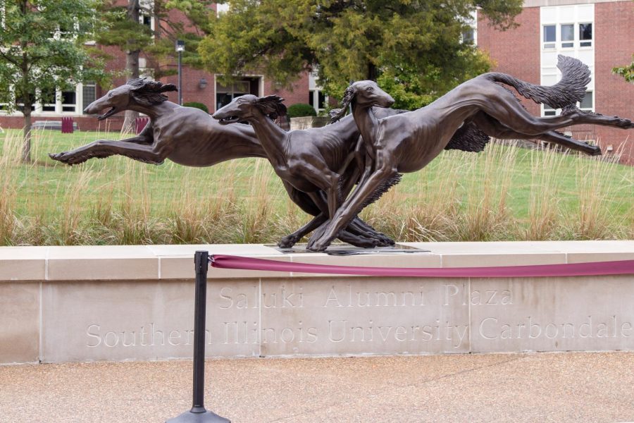 The statue of three Salukis stands proudly at the Saluki Alumni Plaza Ribbon Cutting Ceremony Oct. 15, 2021 in Carbondale, Ill.
