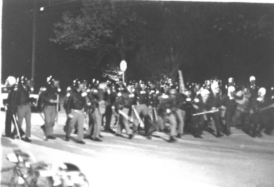 Police approach the students at the Peach March Protest in the fall of 1971 in Carbondale, Ill. 