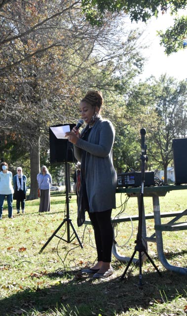A member from The Carbondale Concerned Citizens presents the first speaker Sunday, Oct. 17, 2021 at the new Memorial Monument in honor of those who passed away and who survived the Carbondale Koppers Wood Treatment Facility at Attucks Park in Carbondale Ill. This event also helps to promote racial healing for all the families and people affected by Koppers.
