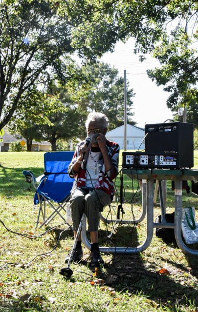 The first speaker talks about her familys experiences while they worked at Koppers Wood Treatment Facility at Attucks Park Sunday, Oct. 17, 2021 in Carbondale, Ill. 
