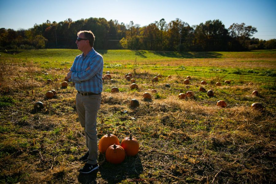 SIU professor, Alan Walters, stands in the pumpkin fields at the Horticulture Farm on Monday, Nov. 8, 2021. Dr. Walters, who is a professor of Vegetable Science and Breeding in the Department of Plant, Soil and Agricultural Systems, is researching how to get pumpkins to grow bigger in hotter climates. 