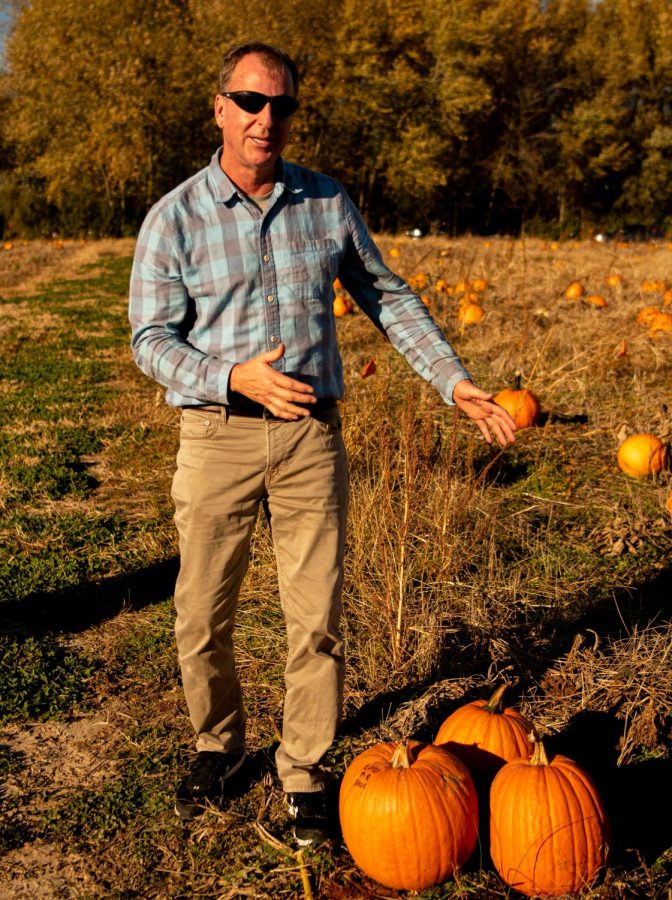 SIU professor, Alan Walters, in the pumpkin fields at the Horticulture Farm on Monday, Nov. 8, 2021. Dr. Walters, who is a professor of Vegetable Science and Breeding in the Department of Plant, Soil and Agricultural Systems, is researching how to get pumpkins to grow bigger in hotter climates. 