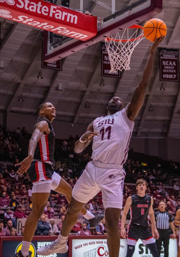 SIU forward, J.D. Muila, goes up for the basket during SIUs 73-55 win over Austin Peay during the Charles Helleny Tip-Off Classic on Friday, Nov. 12, 2021 at the Banterra Center at SIU. 