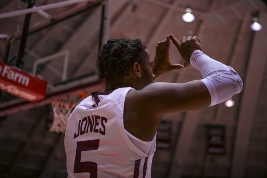 SIU guard, Lance Jones, makes a sign with his fingers during SIUs 73-55 win over Austin Peay during the Charles Helleny Tip-Off Classic on Friday, Nov. 12, 2021 at the Banterra Center at SIU. 