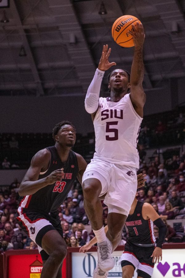 SIU guard, Lance Jones, goes up for the layup  during SIUs 73-55 win over Austin Peay during the Charles Helleny Tip-Off Classic on Friday, Nov. 12, 2021 at the Banterra Center at SIU. 