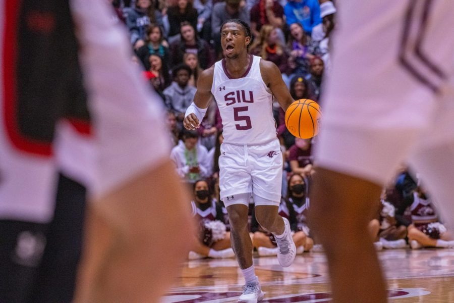 SIU guard, Lance Jones, brings the ball across half court to start a drive for the Salukis during SIUs 73-55 win over Austin Peay during the Charles Helleny Tip-Off Classic on Friday, Nov. 12, 2021 at the Banterra Center at SIU. 