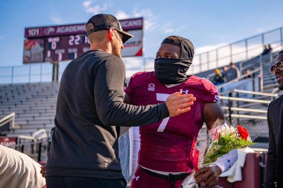 SIU senior safety, Qua Brown, embraces Nick Hill during the pregame ceremony on Senior Day before SIUs 18-35 loss vs. Youngstown State on Saturday, Nov. 20, 2021 at Saluki Stadium at SIU.   