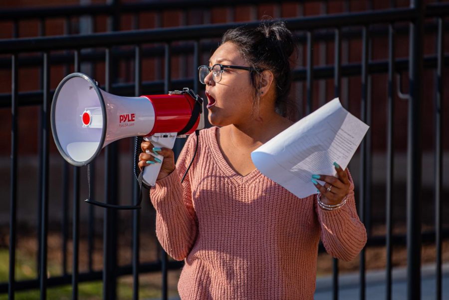 SIU student, Jazmin Vazquez, reads out the list of demands during the die-in protest held by SIU Student Safety Initiative on Dec. 1, 2021 at SIU.  
