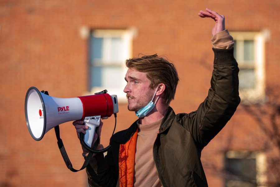 A protester addresses chancellor, Austin Lane, while he meets with students about the list of demands during the die-in protest on Dec. 1, 2021 at SIU. 
