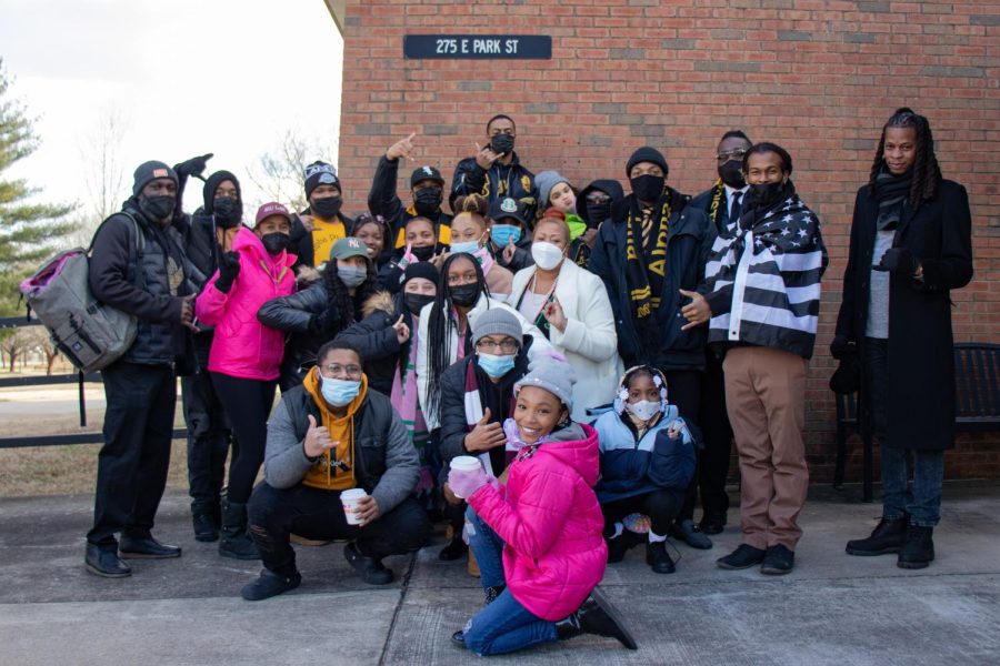 Members, alumni and supporters of the Alpha Phi Alpha Fraternity Inc. pose for a photograph before the annual MLK Day March Jan. 17, 2022 in Carbondale, Ill. 