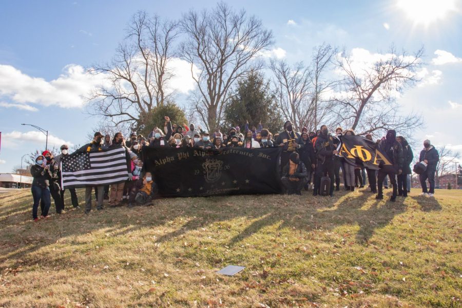 Members, alumni, and supporters of the Alpha Phi Alpha Fraternity Inc. pose for a photo during the MLK Day March Jan. 17, 2022 in Carbondale, Ill. 