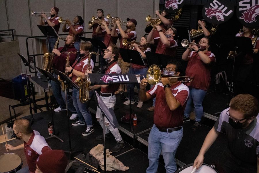 The brass section for the SIU Pep Band plays at the Dawg Pound Maroon Madness Pep Rally Jan. 13, 2022 at the Banterra Center in Carbondale, Ill.
