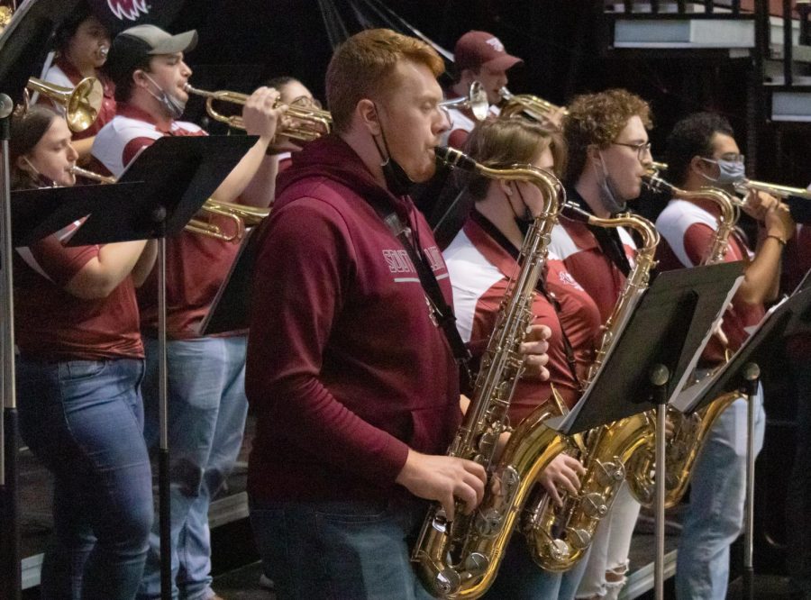 The saxophone section of the SIU Pep Band plays at the Dawg Pound Maroon Madness Pep Rally Jan. 13, 2022 at the Banterra Center in Carbondale, Ill.
