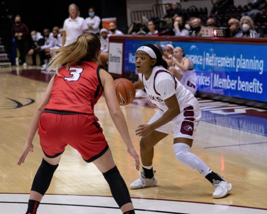 SIU basketball player, Quierra Love, looks for an opening during the game against the Illinois State Redbirds Jan. 20, 2022 at the Banterra Center in Carbondale, Ill. 
