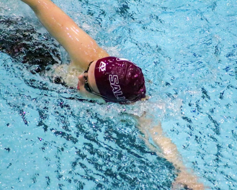 An SIU swimmer swims freestyle for warm ups before her event Jan. 22, 2021 in Carbondale, Ill.
