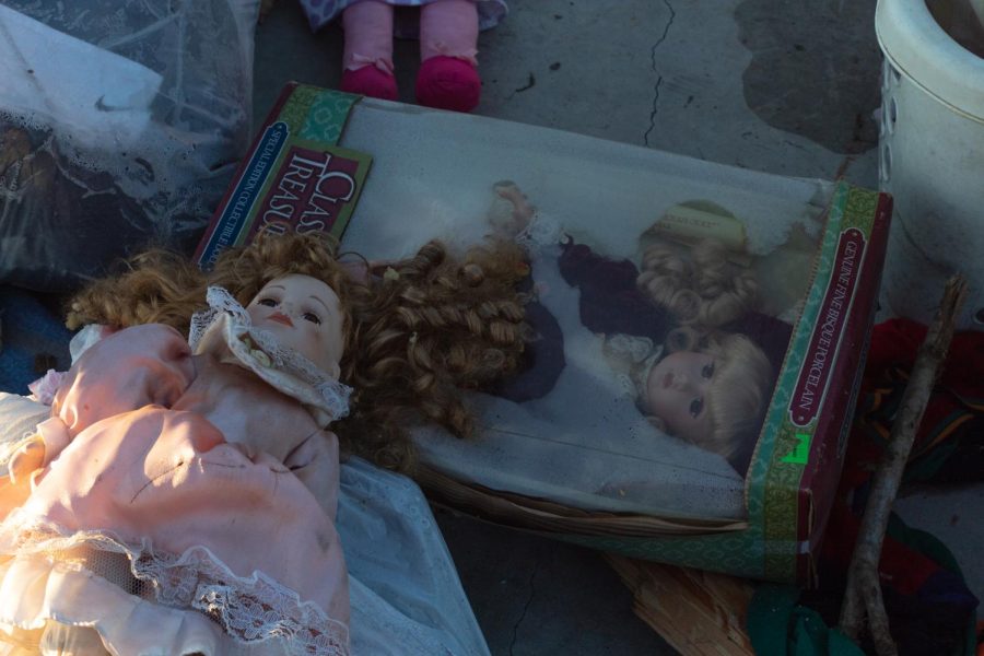Two dolls lie on the ground at a storage unit that was hit by the Dec. 10 tornado Dec. 19, 2021 in Dawson Springs, Ky. 