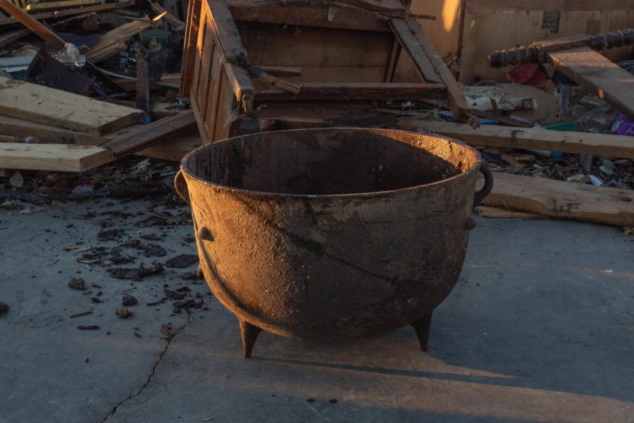 A cast “tea kettle,” belonging to Marvalyn Tolbert, stands as one of the important heirlooms found among the debris of a storage unit that was hit by the Dec. 10 tornado Dec. 19, 2021 in Dawson Springs, Ky.
